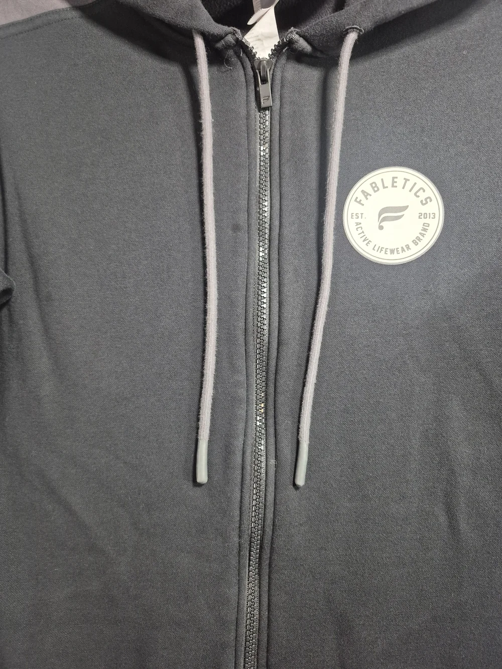 Fabletics Black Zip-Front Hoodie with White Brand Tag